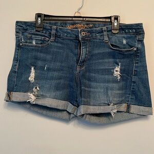 Arizona • medium wash distressed jean shorts